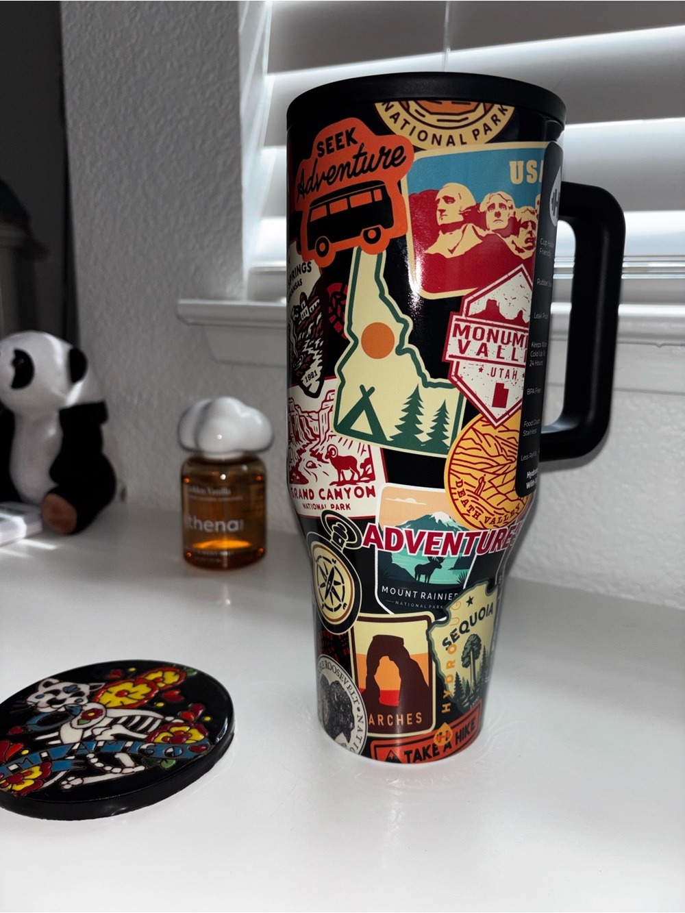 HydroJug Multicolor Maverik Sticker Collage Travel Mug with Black Handle 40 oz